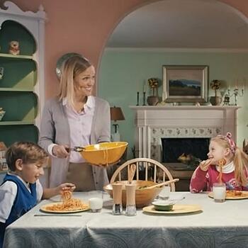 Video Advertising Campaign with woman in dining room with her family